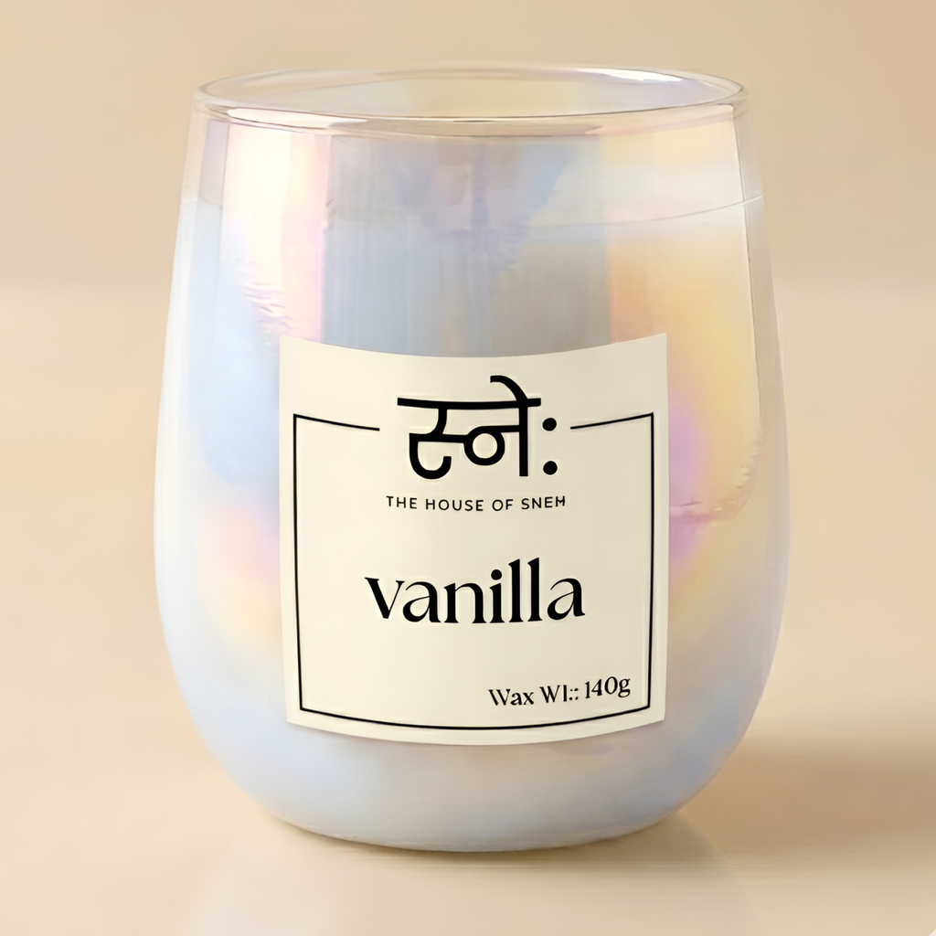 Vanilla scented candle with a label on a beige background