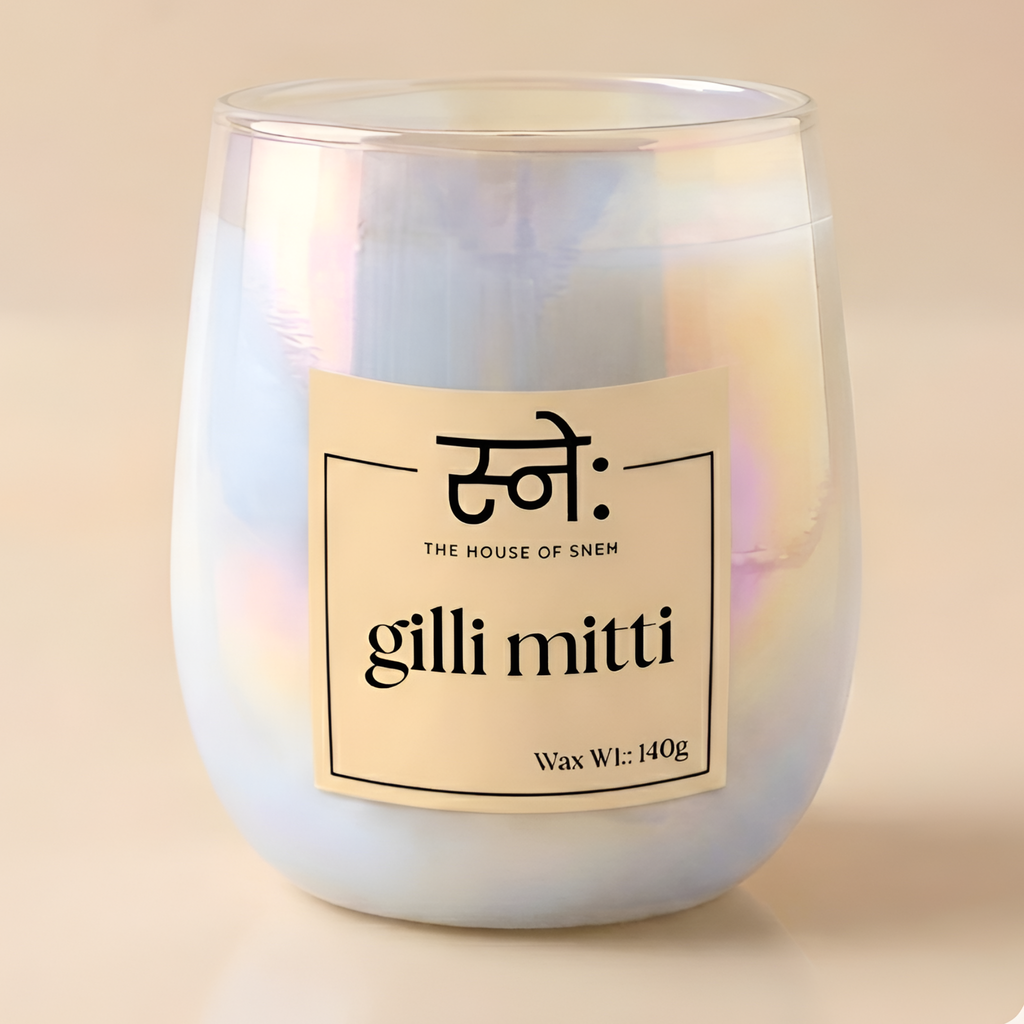 Gilli Mitti Candle with a label on a beige background