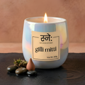Gilli Mitti scented candle styled in moody studio light with earthy props, The House of Sneh