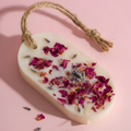 Velvet Musk scented soy wax sachet on warm cream surface, The House of Sneh